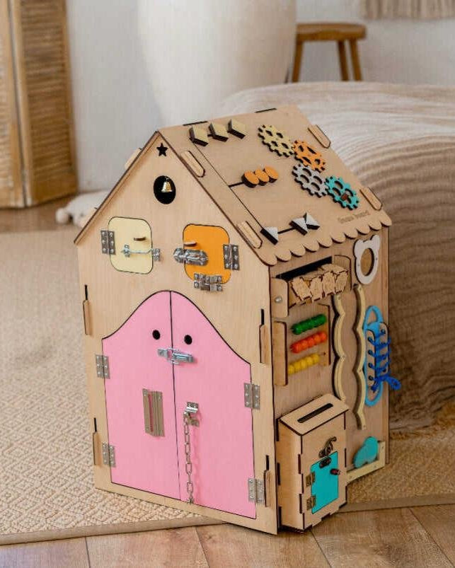 Large Busy Board House (multicolored with a pink door) image 2