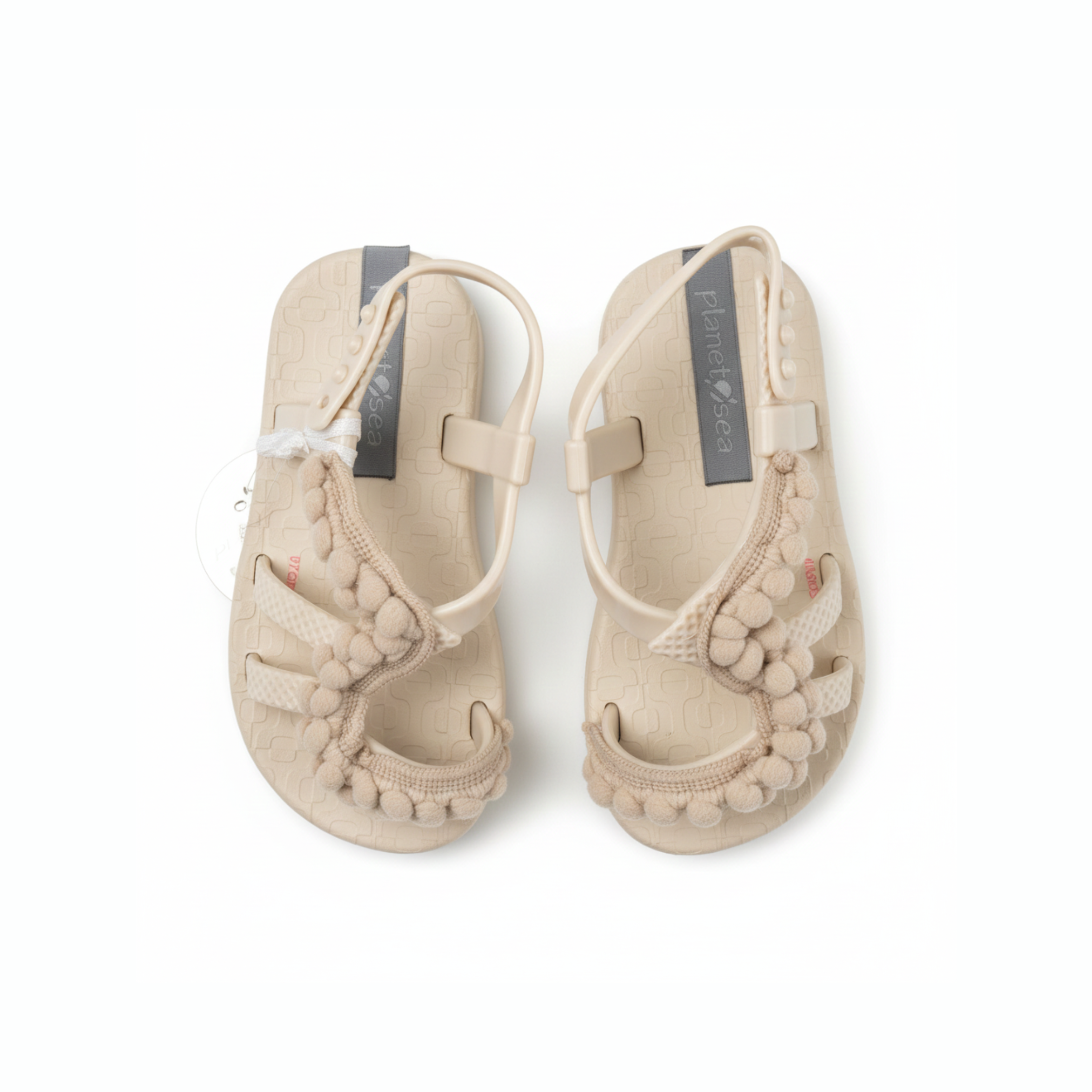 BEIGE POM DOUBLE POM DETAIL